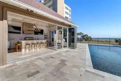 Image de Oceanfront | Luxury Beachfront Home | Wall to Wall Folding Glass Doors Opening to Private Pool Deck