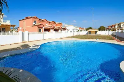 Image de Appartement dans une maison de vacances avec Wifi, climatisation, piscine, Tv, terrasse, parking