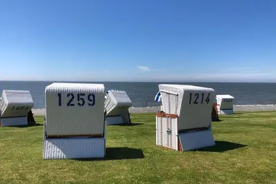 Image de Light-flooded vacation apartment in the center with a view of the fishing boats