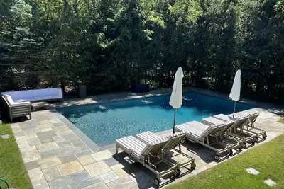 Image de Hamptons home with heated pool.