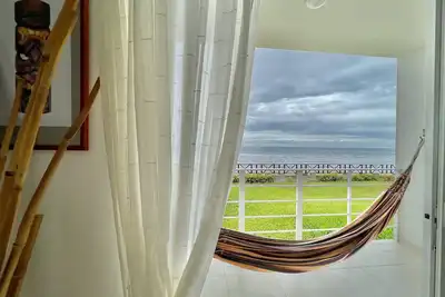 Bright and calm beachfront condo