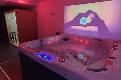 Image de Logement avec spa et sauna privatisés