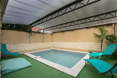 Image de Superbe appartement deux chambres avec piscine situé en hypercentre - Parking