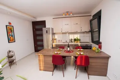 Image de Red apartment of Ema star apartments is on the first floor.