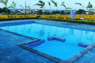 Quite private villa  with pool and gym access 5 min from the beach