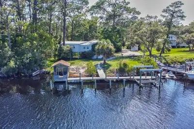 Home on Carrabelle River with a dock