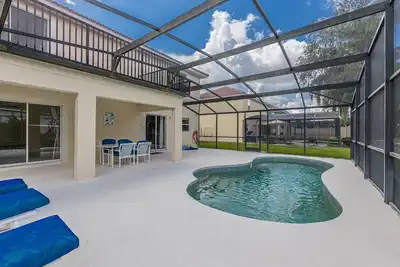 Image de Like New! Modern & Stylish 4 Bed 3-Bath Pool home, Quiet neighborhood. Near Disney