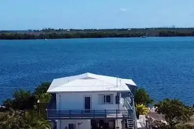 Image de Ocean views from every room. This peaceful and gorgeous property has a New Dock!