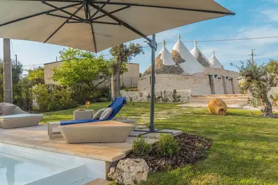 Image de Maison de vacances 'Trulli Terralunga' avec piscine chauffée et Wi-Fi