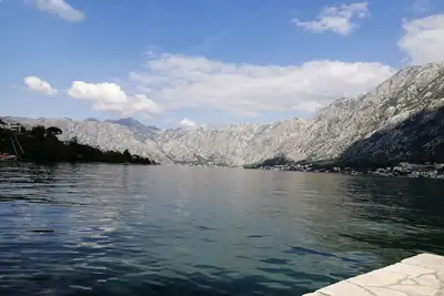 Kotor Bay;  4 Bed Seafront  house with beach and seating area. Close to Kotor.