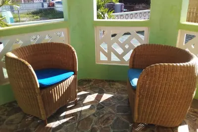 South Side. . . . . . Quaint and attractive\nQuiet and breezy patio. \n