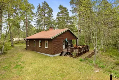 Image de Cozy vacation home in the forest - 10 min. walk from the beach