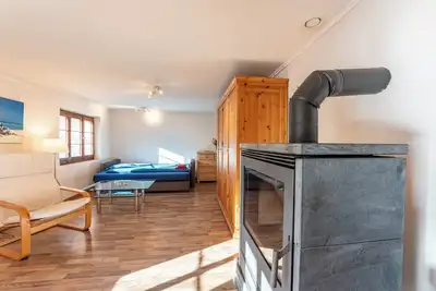 Image de Cozy chalet with wood burning stove surrounded by Swiss Alps