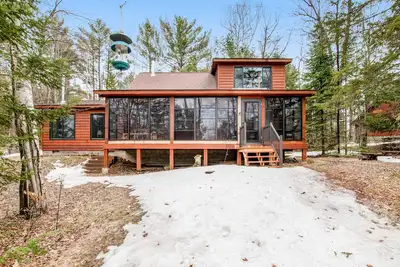 Image de Riverfront vacation home with a dock, wood stove, full kitchen, & firepit