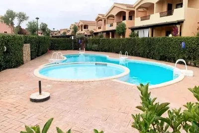 Image de Maison de vacances 'Turchese' avec vue sur montagne, piscine partagée, terrasse privée & A/C