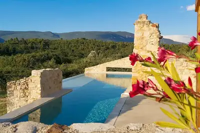 Remarkable architectural countryside appartment with far reaching views and pool