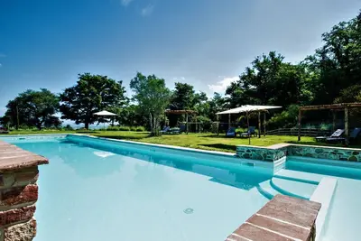 Image de Joli appartement avec climatisation, Wifi, piscine, Tv, patio, animaux admis et vue panoramique