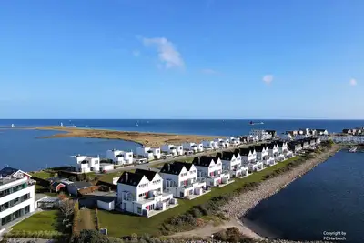 Image de Appartement 'Fewo Ostseeflair By Seeblick Ferien' avec vue sur mer, balcon et Wi-Fi.