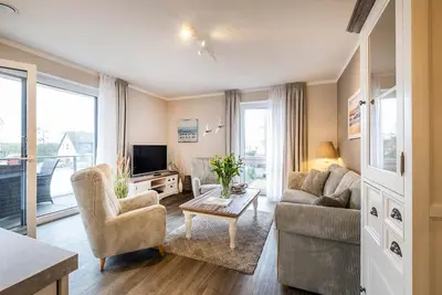 Image de Haus Strandläufer - vacation apartment for 4 people on the North Sea dike