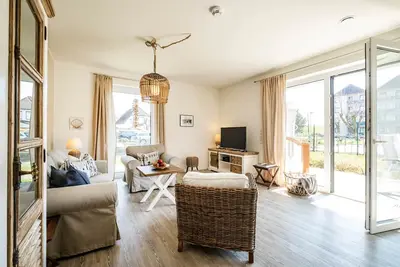 Image de Haus Strandläufer - vacation apartment for 4 people on the North Sea dike