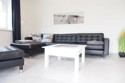 Image de Haus Strandläufer - vacation apartment for 2 people on the North Sea dike