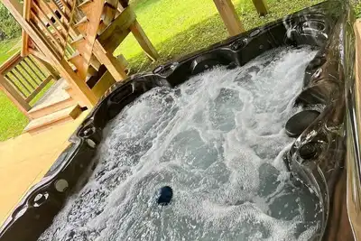 Wooded Retreat with game area and hot tub!