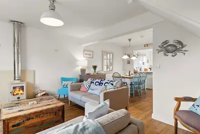 Image de Crab Cottage is just a 5-minute walk to the beach and comfortably sleeps six guests.