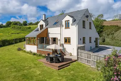 Image de 4 chambres à coucher à Tenby