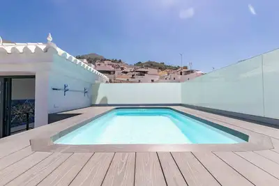 Image de Appartement spacieux à Cómpeta, avec vue sur les montagnes, terrasse et Wi-Fi.