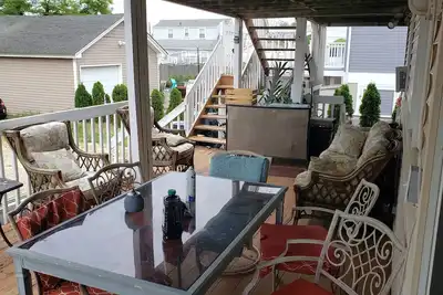 Image de Steps to the beach and boards, with decks and parking