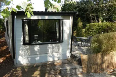Image de Beautiful chalet for rent overlooking ornamental pond against forest + parking lot
