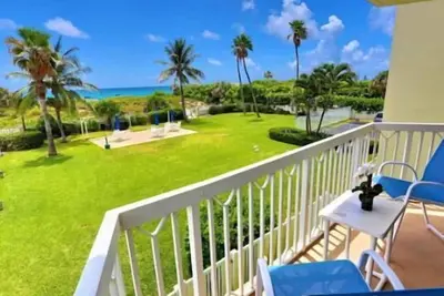 Image de Oceanfront living at its best, with private beach and pool access.