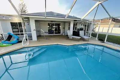 Image de South Florida Heaven! Private Pool! 3bd 2ba! Pets Ok! 20 minutes to the beach!