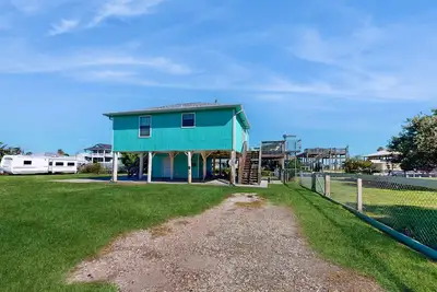 Image de Dog-friendly, canal-front home with boat ramp, dock, large yard, WiFi, & Ac