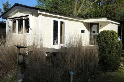 Image de Spacious chalet for rent with nice view over the grounds against forest