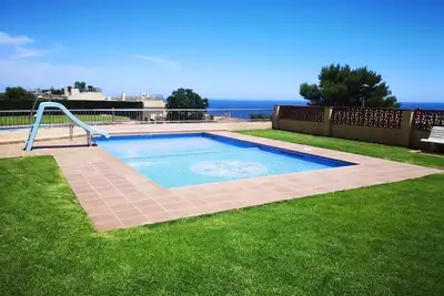 Image de Acogedor apartamento con piscina y vistas al mar