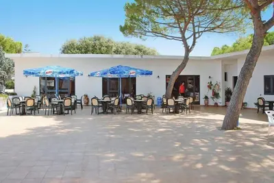Image de Bungalow dans un resort Ă Lido del Sole avec terrasse-anc. Tui