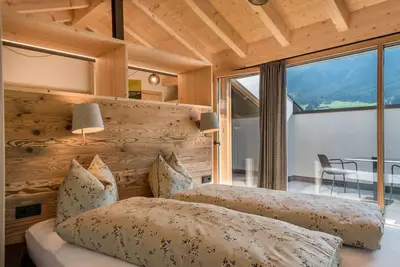 Image de Appartement Reguz avec vue sur les montagnes, jardin, terrasse, sauna et Wi-Fi.