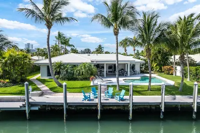 Seven Palms Waterfront - Private Dock, Heated Pool & Cabana - Walk to Beach!