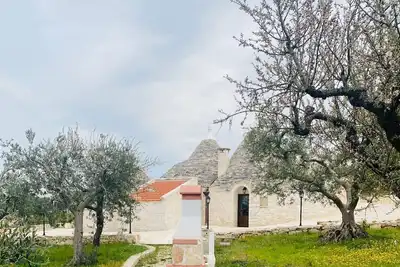 Image de Trullo with private pool and parking 5 minutes from the Trulli area
