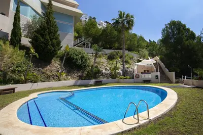 Image de Bel appartement pour 4 personnes avec Wifi, climatisation, piscine, Tv, terrasse et parking