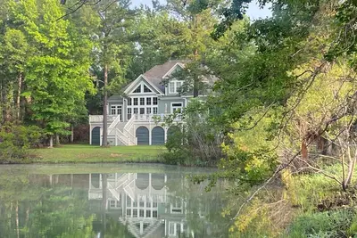 Beautiful Custom Home Overlooking Pond