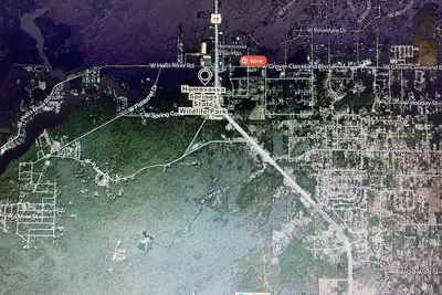 Image de Rv rustic parking 1\/4acre quiet unpaved road, close to 19. (Water only hookup)