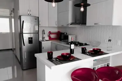 Image de Elegant & Cozy 3 Bedroom Apt Near Medical & Sports Center Imbanaco, Wifi Ac, Pool