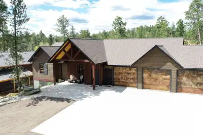 Image de One-Of-A-Kind Custom 5100 Sq. Ft. Lodge W/ Slide, Fire-pit, and Hot Tub!
