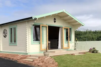 Image de Lovely cabin with country views in popular Somerset village.