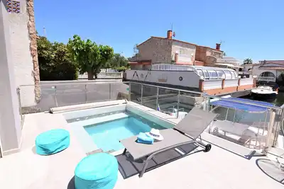 Image de 392-Empuriabrava, villa moderne sur le canal avec amarre de 10 mts, jacuzzi et wifi