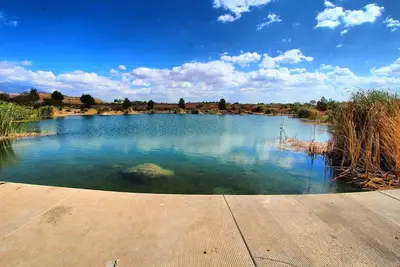 Image de Coral Canyon Golf Course, large family pool, and fishing pond