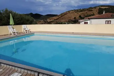 Image de Penthouse in San Teodoro with shared swimming pool