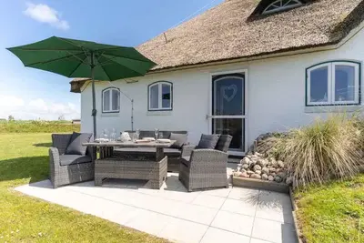 Image de Seesternchen - beautiful apartment in a Haubarg directly in Ording!